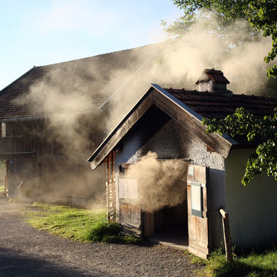 It was quite common for people to bake their own bread in rural areas until about 1950, so farms often included baking houses among their outbuildings.